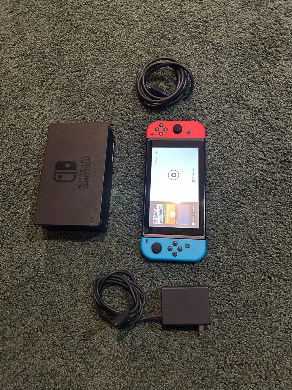 Nintendo Switch with Neon Red & Neon Blue Joy-Con Controllers